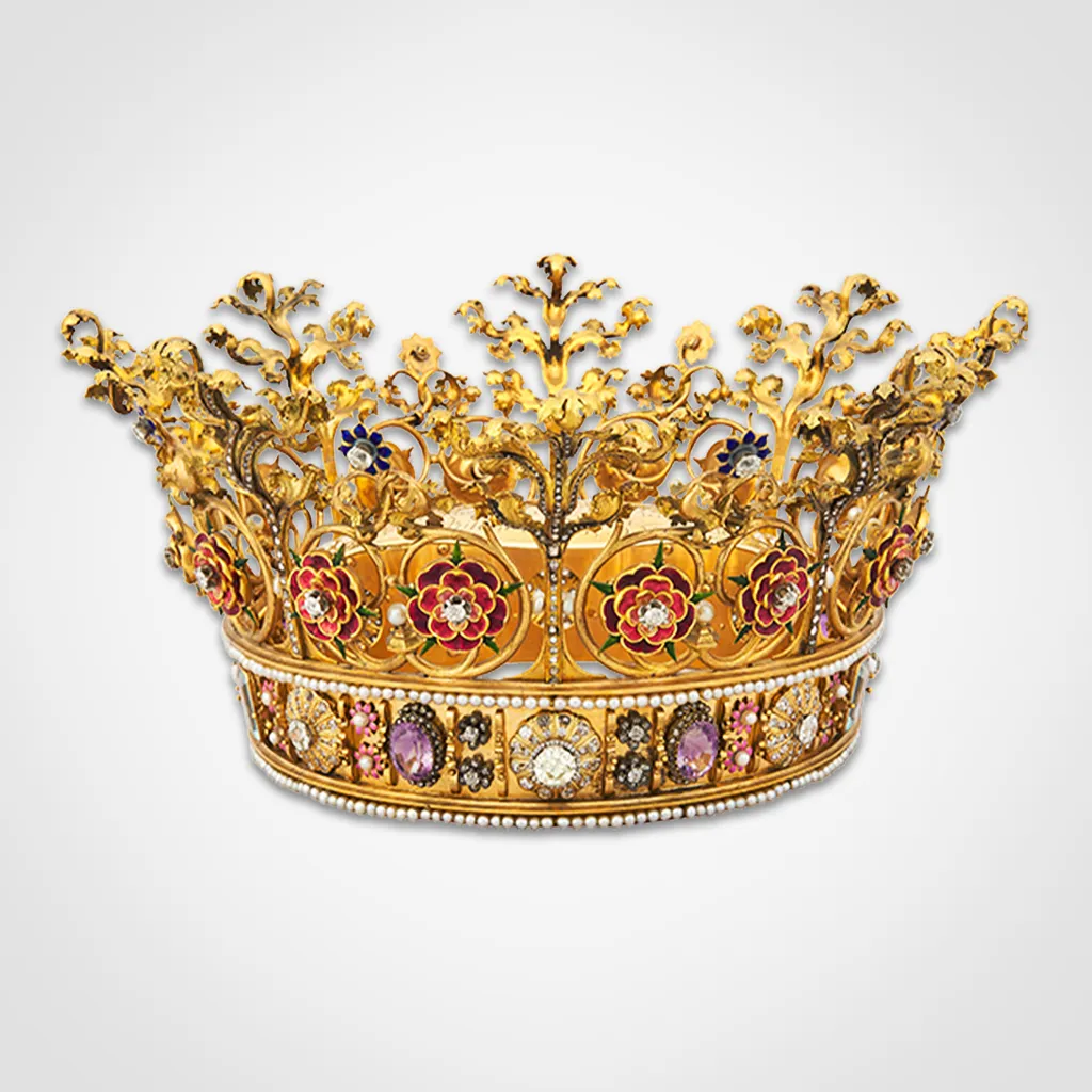 golden crown with floral designs and gemstones