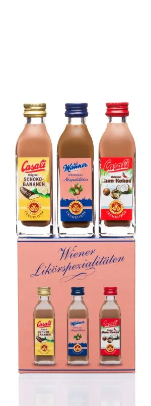 Three small schnapps bottles with Casali and Wörner labels displayed above a pink box with 'Wiener Likörspezialitäten' text