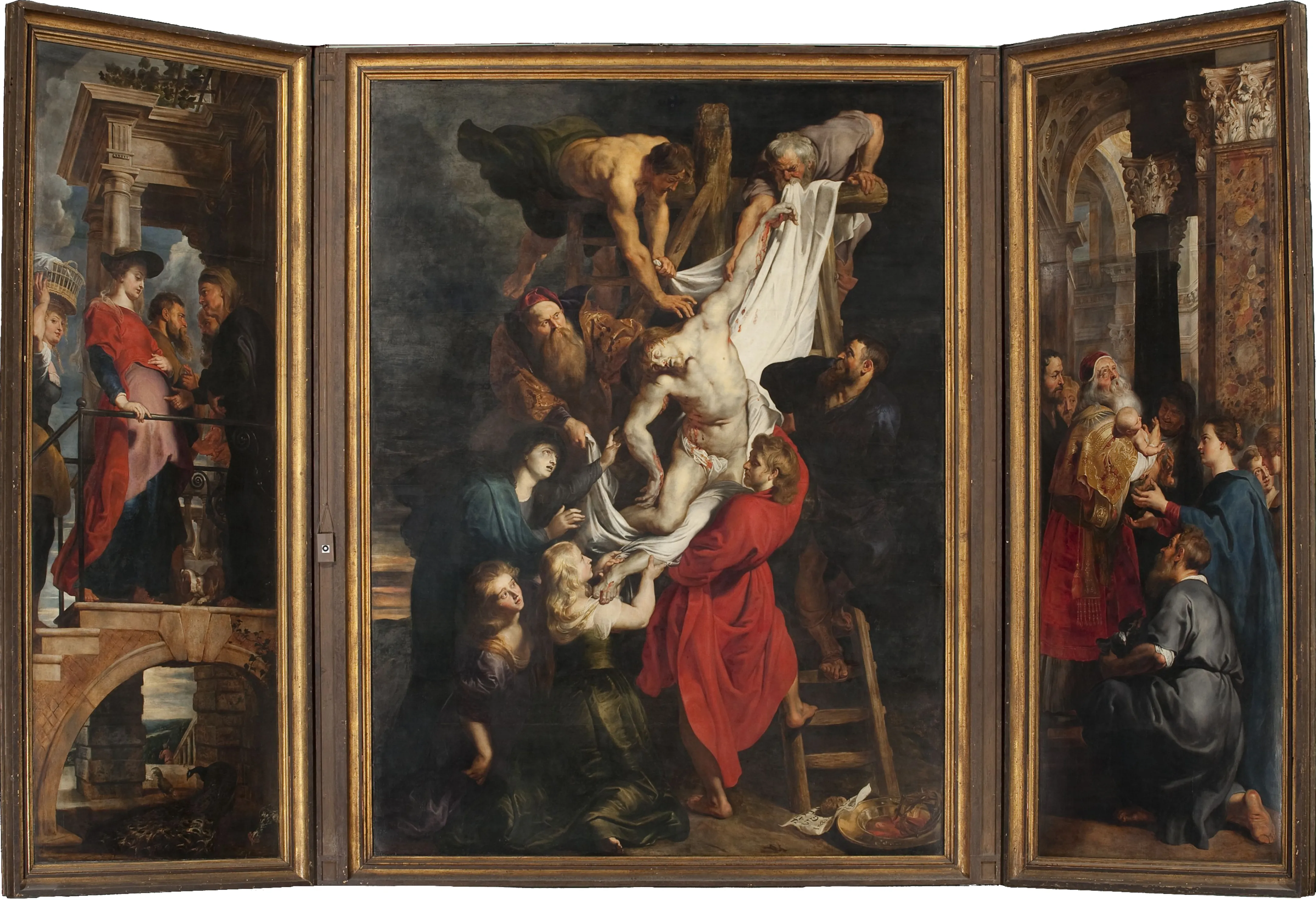 Retablo tríptico con el Descendimiento de la Cruz de Peter Paul Rubens, compuesto por tres paneles que representan escenas bíblicas del descendimiento de Cristo de la cruz.