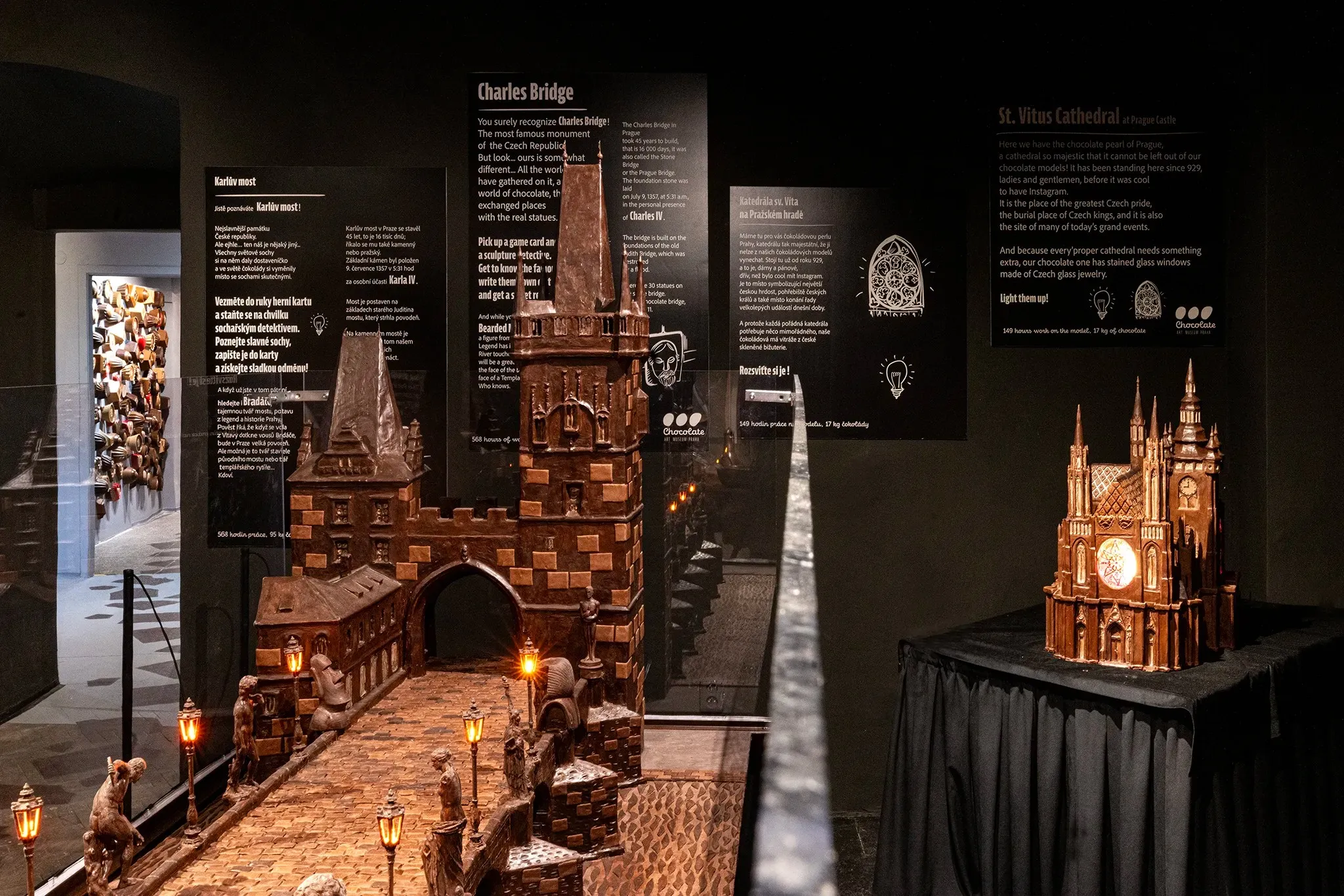 Chocolate sculptures of Charles Bridge and St. Vitus Cathedral on display in a museum gallery