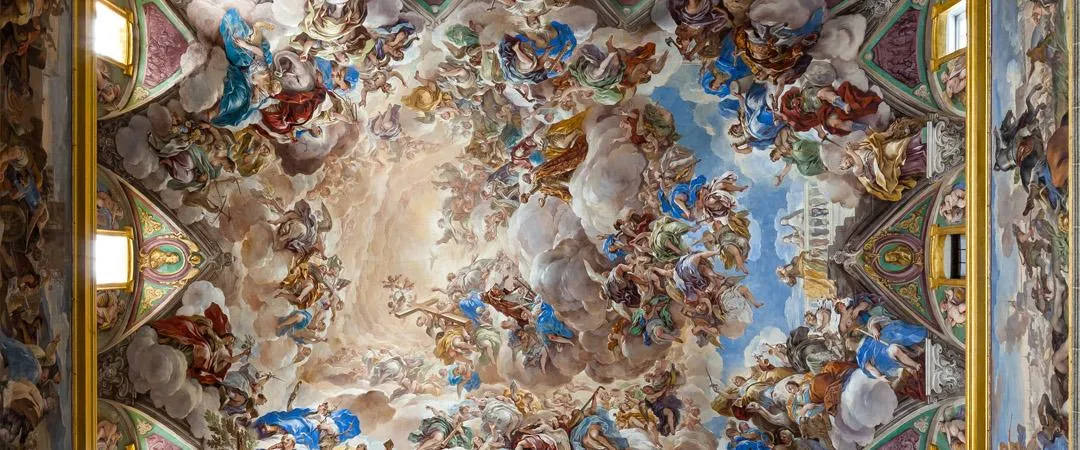 Ornate ceiling fresco with religious figures and golden architectural details