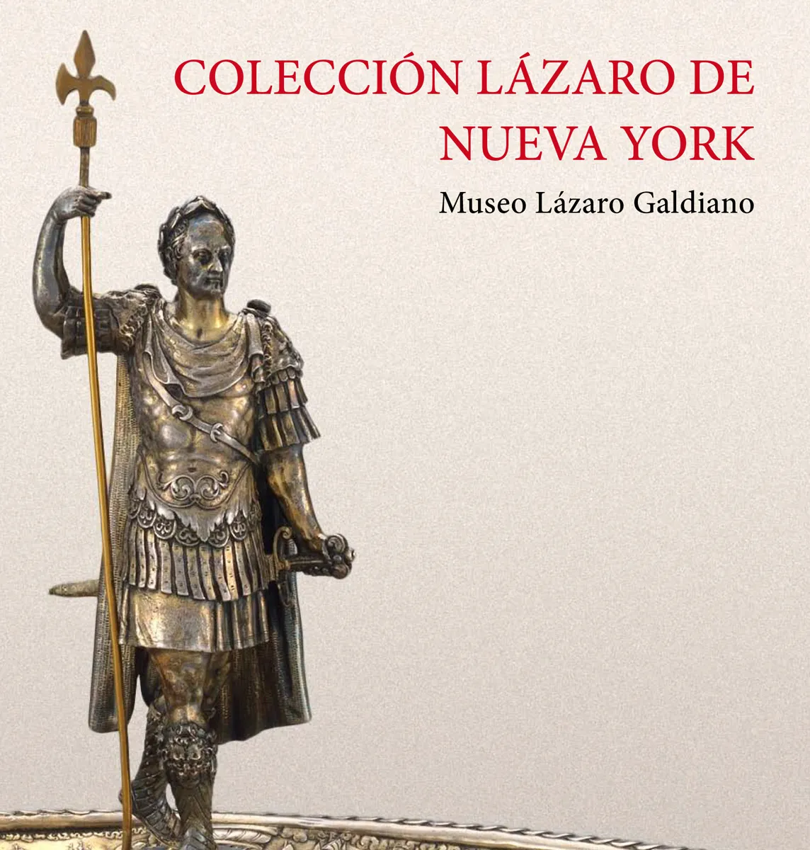 Estatua de bronce de un soldado romano portando una lanza, con el texto 'COLECCIÓN LÁZARO DE NUEVA YORK' y 'Museo Lázaro Galdiano' encima