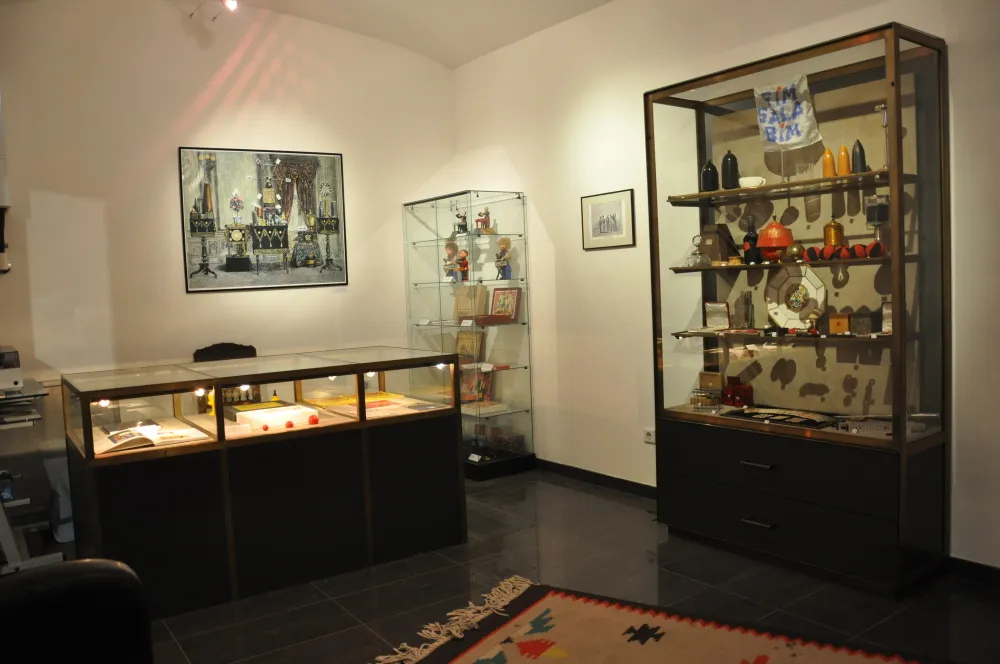 Interior of Magic Box Museum with glass display cases containing magic props and artifacts