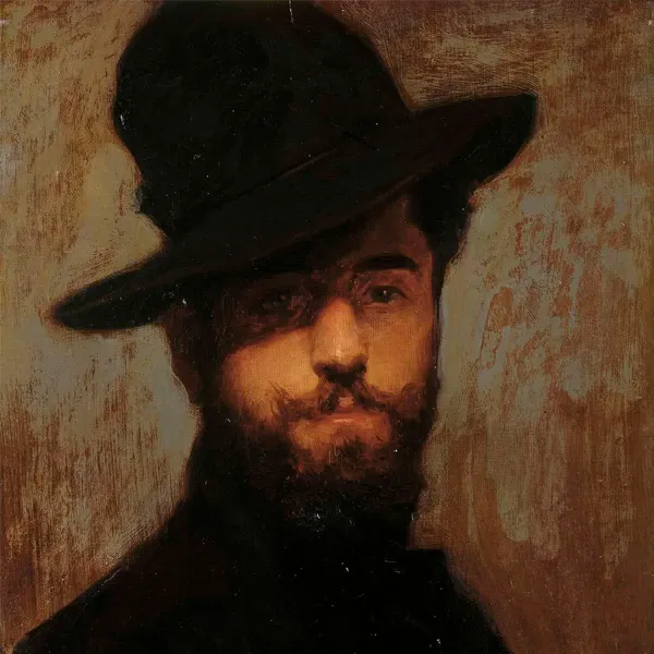 portrait of a bearded man wearing a black hat