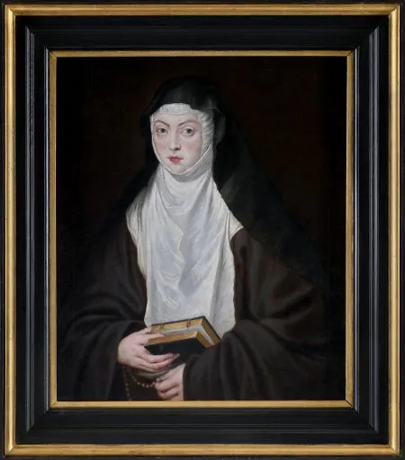 framed portrait of a nun in white and black habit holding a book