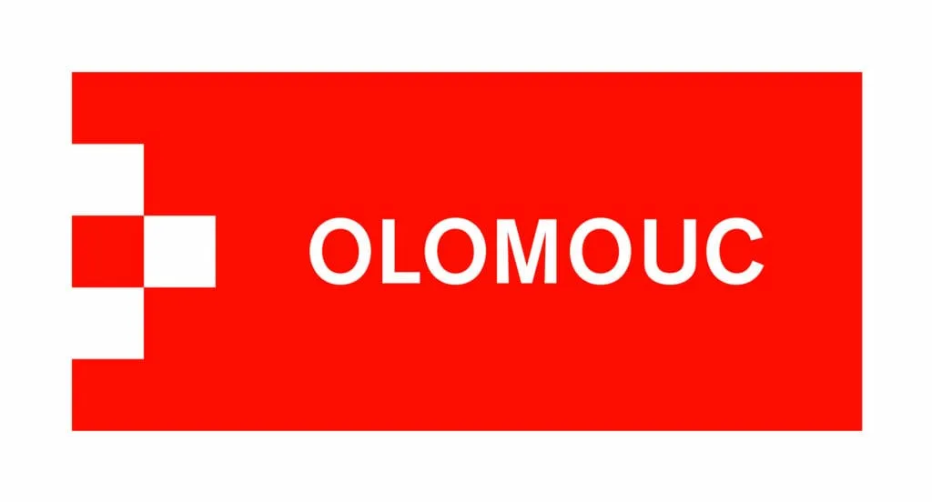 Red rectangle with a white stylized cross and the word OLOMOUC in white text