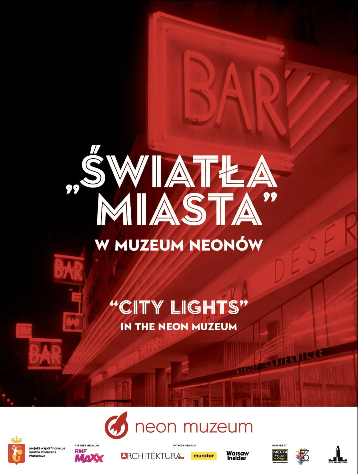 Red-tinted image of neon signs with text 'ŚWIATŁA MIASTA' and 'CITY LIGHTS' in the Neon Museum