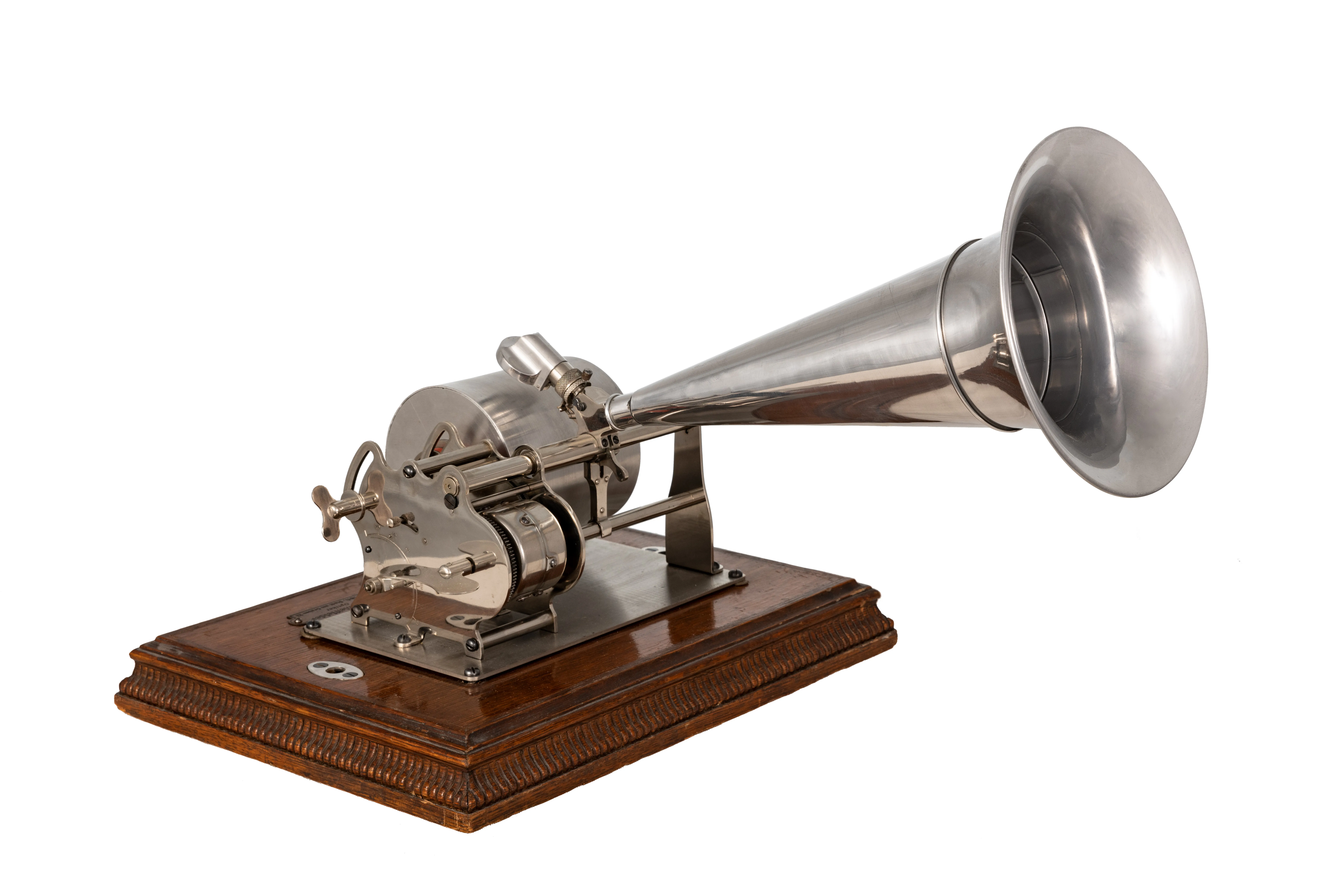 A vintage gramophone with a metal horn on a wooden base