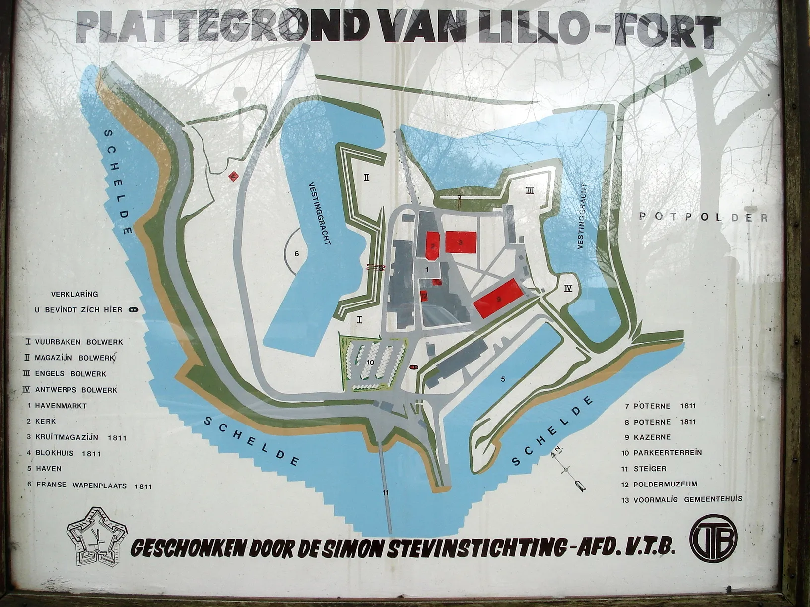 Mapa del Fuerte Lillo que muestra la disposición del fuerte rodeado por el río Escalda, con edificios numerados y una leyenda en holandés