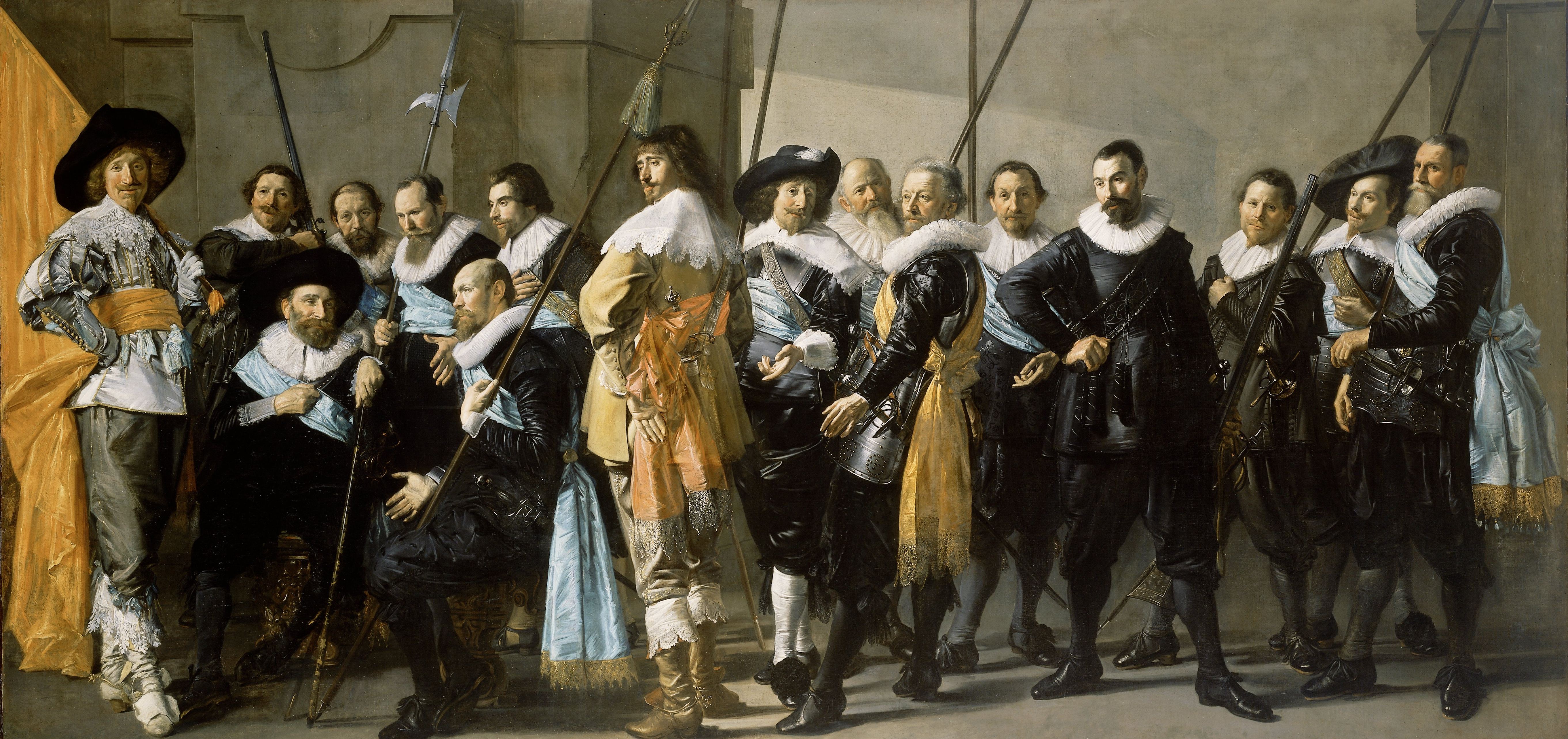 Mannen in Nederlandse militiekostuums uit de 17e eeuw met wapens verzameld in een historisch groepsportret.
