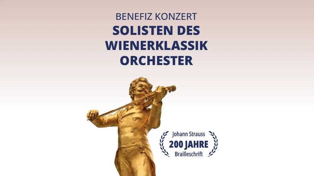golden statue of a violinist with text about a benefit concert and 200 years of Braille script