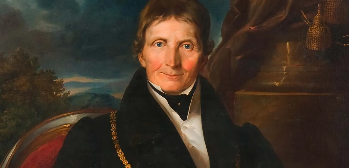 a portrait painting of a man in a black coat and white shirt with a gold chain