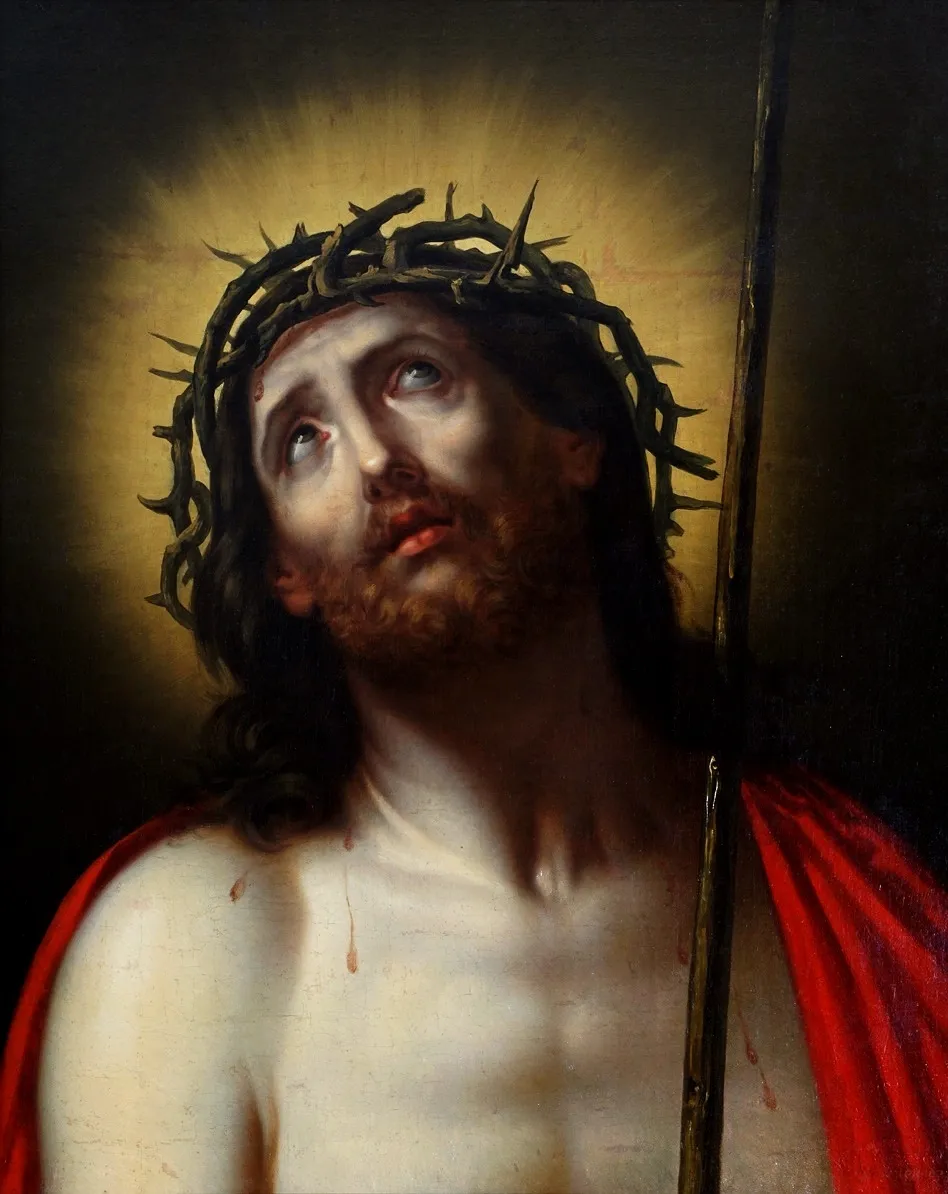 Jezus Christus met een doornenkroon en een lichtkrans achter zijn hoofd, met een rode doek over zijn schouder gedrapeerd