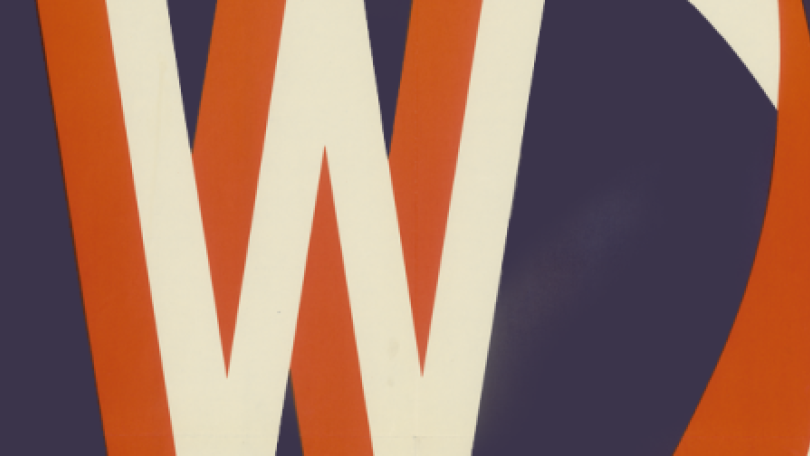 Close-up of a stylized white and orange 'W' logo on a dark blue background